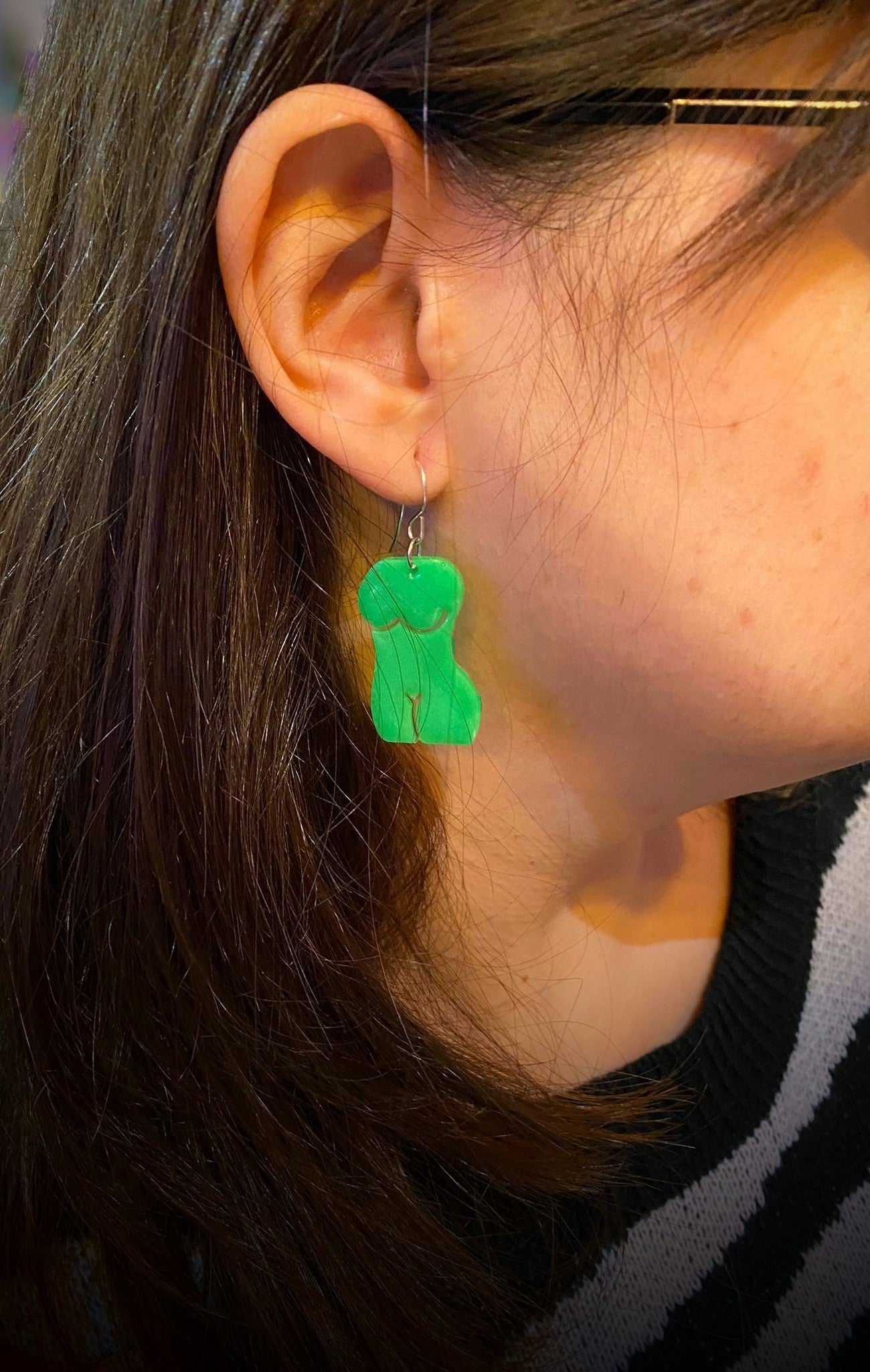 Pendientes en forma de figura femenina